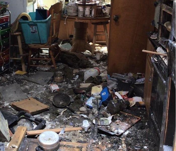 Fire damage in kitchen due to microwave fire