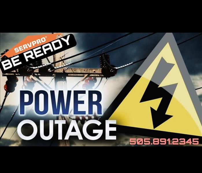 Power outage words in front of damage power lines and caution signs